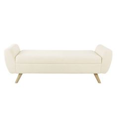 an upholstered white bench with wooden legs and back rests on a white background