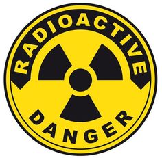 radioactive danger sign in black and yellow on a white background