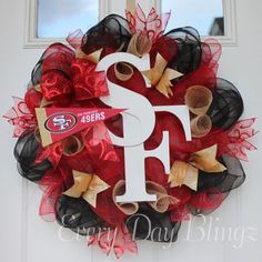 a wreath with the letter s on it