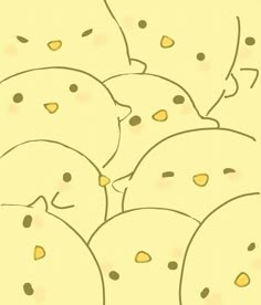 a bunch of small yellow birds sitting in the middle of each other's heads