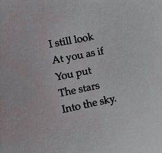 an old book with the words i still look at you as if you put the stars into the sky