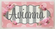 the name ariana is surrounded by pink flowers and gray stripes on a pink background