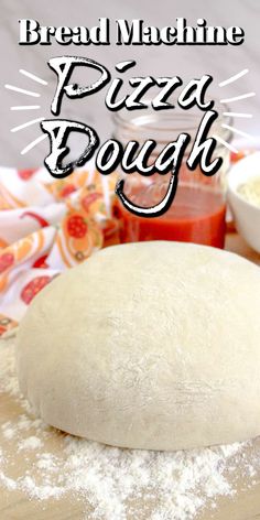 bread machine pizza dough sitting on top of a wooden board