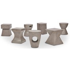 several cement vases and stools are arranged in a row on a white background