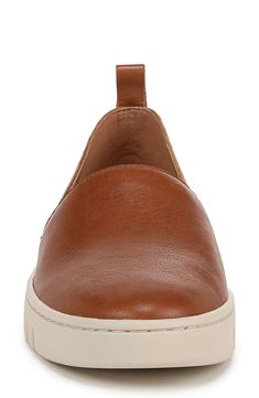 A rear pull-tab adds easy entry to a slip-on sneaker grounded by a subtle platform and durable rubber sole. 1" platform Removable, cushioned insole with arch support Leather upper/synthetic lining/rubber sole Imported Leather Working Group certified This product meets Nordstrom Responsible Sourcing and Manufacturing criteria: made with practices that meet higher environmental or social standards Social Standards, Fall Sneakers, Fly London, 2024 Fashion, Scarf Jewelry, Travel Companion, Shoes Booties, Mid Calf Boots, Canvas Sneakers