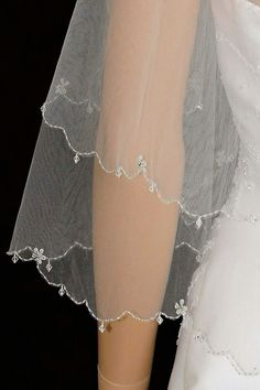 a close up view of a bride's veil