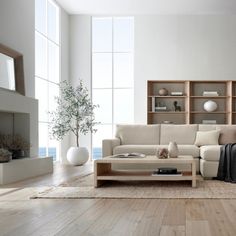 a living room with white walls and wooden flooring is featured in an ad for the view in room