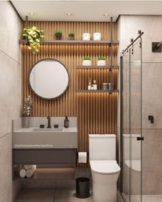 a bathroom with a toilet, sink and shower stall in the corner next to a wooden paneled wall