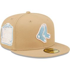 the new era 59fifty fitted hat is available in tan and light blue