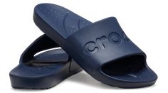 This simple, easy to wear slide offers essential Crocs comfort and style at an amazing price. A sleek upper features the Crocs logo, and a fully molded Croslite™ design makes it lightweight and comfortable. An everyday slide sandal that’s so perfect, you’ll want multiple pairs!  Crocs Slide Details:    Sleek upper featuring Crocs logo   Incredibly light and easy to wear   Fully molded Croslite™ material for signature Crocs comfort Casual Synthetic Slides That Are Fade-resistant, Casual Lightweight Slides, Casual Slides With Arch Support And Synthetic Material, Casual Sports Slides Slip-on, Casual Slip-on Sports Slides, Lightweight Synthetic Slides, Lightweight Functional Synthetic Slides, Functional Lightweight Synthetic Slides, Casual Sports Slides With Slip-resistant Sole