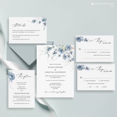 wedding stationery suite with blue flowers and white ribbon on grey background by sweetboom designs