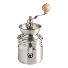 a metal container with a wooden spoon in it's mouth and a lid on the top