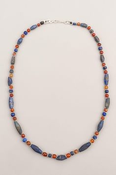 "Ancient faceted lapis lazuli beads and carnelian beads paired with silver granulated ring beads. Seven of the longer lapis bi-cone beads have extensive end wear; the ends are angled to almost forty-five degrees. This is evidence that the beads have had a long history of use. The carnelian beads are round and alternate with the lapis beads. The lapis beads alternate in shapes, round and bi-cone; and there is a granulated silver ring bead between each of the stone beads. One of these has four sid Three Strand Necklace, Bead Tips, Lapis Lazuli Beads, How To Make Box, Carnelian Beads, Beaded Rings, Fine Silver, Spacer Beads, Vintage Necklace