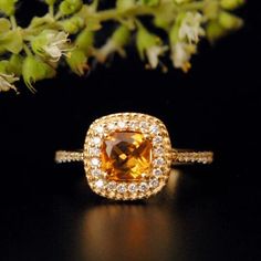 Citrine & CZ Diamond Ring Handmade Designer Ring 925 Sterling Silver Gold Plated Ring Citrine Ring Victorian Ring Diamond Ring Wedding Ring Manufacture Country : India * Customization always available for Ring size, metal selection and any type of center stones changes, etc.... * If you want to make your own idea of Jewelry we can do it. Material : 925 Sterling Silver Main Stone : Citrine Secondary Gemstone : CZ Diamond Gemstone Color : Yellow  Gemstone Shape : As Seen In A Picture Ring Size : All Size Available Weight : 9.84 gm Gemstone Type : Lab Gemstone * Shipment will dispatch within maximum 2-3 Days of Order done * Some Special customization can take more Time * UPS, DHL, FEDEX OR ARAMEX Will be available for Delivery Victorian Diamond Ring, Picture Ring, Diamond Ring Wedding, Victorian Ring, Yellow Gemstones, Victorian Rings, Citrine Ring, Plated Ring, Gold Plated Rings