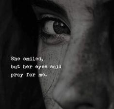 a woman's face with the words she smiled, but her eyes said pray for me