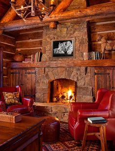 a living room filled with furniture and a fire place