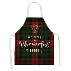 an apron with the words, the most wonderful time on it and a plaid pattern