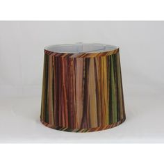 a multicolored lamp shade on a white background