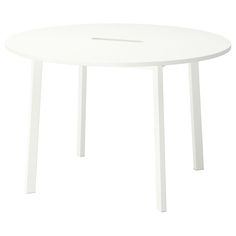 a white round table with two legs