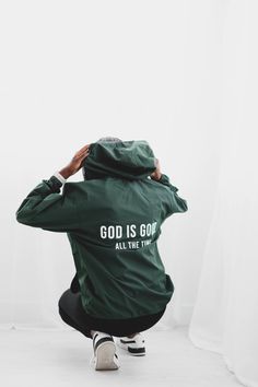 God is Good. All The Time.DESCRIPTIONThis limited-edition Champion lightweight wind and water-resistant jacket features a “God is Good. All The Time” design printed on the back. It packs into its own pocket and stands up to the weather without the bulk. FEATURES Packable water-resistant jacket Half-zip from hood Branded with our Victorious Caps screen logo on left side chest Front oversized pouch pocket and side pockets Attached scuba collar with hood Adjustable bungee drawcord at hood and hem E Winter Green Moisture-wicking Windbreaker, Green Moisture-wicking Outerwear For Streetwear, Green Moisture-wicking Windbreaker For Streetwear, Green Moisture-wicking Outerwear For Fall, Side Chest, Water Resistant Jacket, Wind And Rain, Time Design, Windbreaker Jacket