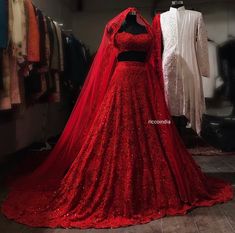 a red wedding dress with a cape on it