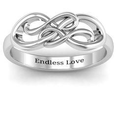 a ring with the words endlessess love engraved on it and an intertwined band