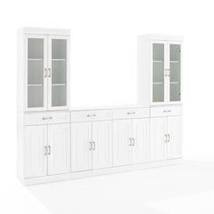 Amazingly versatile with storage galore! The Stanton 3pc Sideboard and Glass Door Pantry Set has the look of classic built-in cabinetry with a flexible modular design. Featuring a total of six large cabinets with adjustable shelves, this home organization set stows a variety of everyday items. Two of the cabinets feature tempered glass doors for displaying dishware or keepsakes, while the remaining cabinets have panels doors for keeping everyday items out of sight. Perfect for a dining room or h Glass Door Pantry, Sideboard Pantry, Pantry Dimensions, Large Cabinets, Tempered Glass Door, White Sideboard, Large Cabinet, Low Cabinet, Furniture Catalog