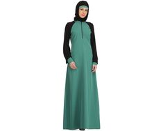 TAFIDA LIGHT GREEN KASHIBO & BLACK JERSEY SLEEVES SPORTS ABAYA Item Details: A flattering fit and bold sporty trim are just the statements of this abaya. -Stand collar. -Front zip opening. -Straight jersey sleeves & contrast cuffs with gathers. -Utility pockets on both sides. -A-line Abaya. -Matching Square Hijab (100*100 cm) and Band Included. Specifications: Colour: Light Green & Black Fabric: Light Green Kashibo (100% polyester) & Black Jersey (100% viscose) Care: Machine and Hand Wash with l Eid Green Maxi-length Abaya, Green Maxi Length Abaya For Eid, Green Maxi-length Abaya For Eid, Green Niqab For Eid, Green Long Sleeve Niqab For Eid, Green Fitted Long Sleeve Abaya, Fitted Long Sleeve Green Abaya, Fitted Black Thobe For Eid, Sport Abaya