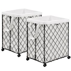 two black and white storage bins with handles