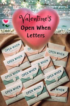 valentine's open when letters are written on envelopes with hearts and lights in the background