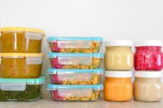 there are many containers with food in them on the shelf next to each other,