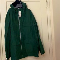 Nwt Uniqlo Green Hooded Jacket Size: 3xl Good Condition Never Worn Tags Attached Green Casual Windbreaker For Cold Weather, Casual Green Windbreaker For Cold Weather, Casual Green Raincoat With Pockets, Uniqlo Winter Outerwear With Pockets, Oversized Weatherproof Casual Outerwear, Casual Oversized Weatherproof Outerwear, Casual Green Utility Jacket With Adjustable Hood, Oversized Weatherproof Long Sleeve Outerwear, Oversized Green Outerwear With Double-lined Hood