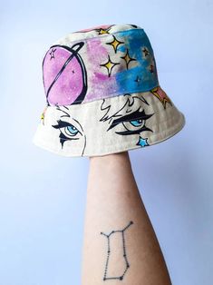 Space Girl Bucket Hat White Bucket Hat Handmade Handpainted - Etsy Whimsical Bucket Sun Hat, Artistic Hand Painted Sun Hat For Festivals, Artistic Bucket Hat For Beach, Adjustable Whimsical Bucket Hat, Whimsical Adjustable Bucket Hat, Whimsical Adjustable Bucket Sun Hat, Adjustable Whimsical Bucket Sun Hat, Artistic Beach Bucket Hat, Handmade Whimsical Summer Bucket Hat