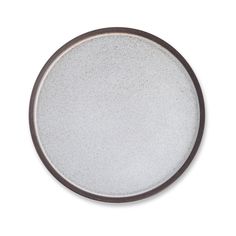 a white and brown plate on a white background