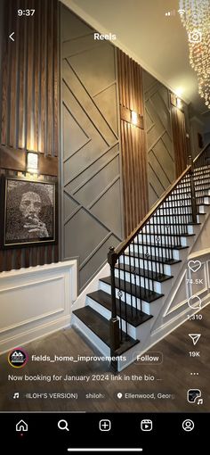 the stairs in this house are decorated with wood paneling and glass chandelier