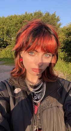 Red Orange Shag Hair, Red And Orange Streaks Hair, Alt Short Hairstyles With Bangs, Red And Black Hair Short Alt, Black And Red Fluffy Hair, Alt Hair Inspo Short, Hair Colors With Blue Eyes, Black And Red Shag Hair, Short Red Black Hair