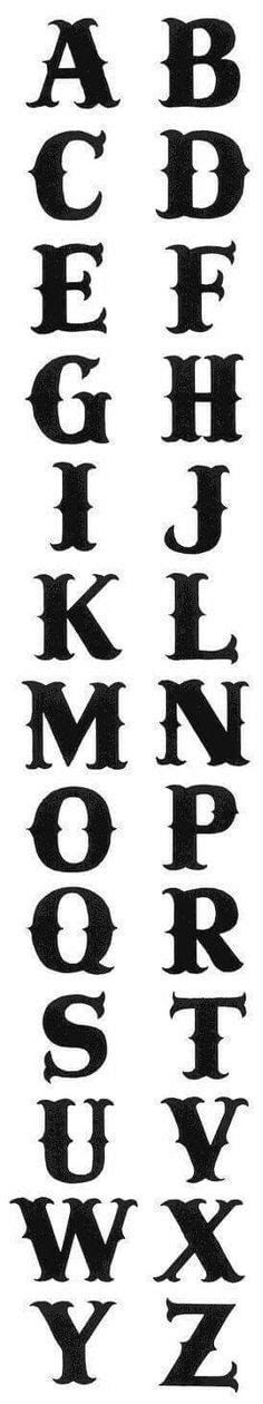 some type of font that has been drawn in black ink on white paper, with the letters