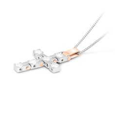 A beautiful symbol of your faith, this shimmering white and rose gold cross pendant is a look you'll wear with everything. Crafted in 18K gold, this timeless choice showcases dazzling diamonds lining a simple cross shape.  A fashionable look she'll adore and wear daily as well as on special occasions. The perfect gift for an anniversary.
2.98 carat Round cut diamonds Cross
color: D-Fclarity: VS-SI
18k white and rose gold

We offer a Free virtual Consultation from the comfort of yo Virtual Consultation, Zipper Bracelet, Cross Shape, Simple Cross, Beautiful Symbols, Gold Cross Pendant, White Gold Chains, Diamond Cross Pendants, Orange Sapphire