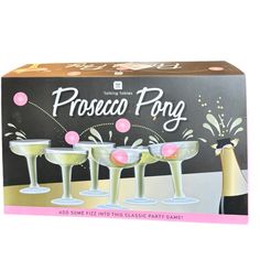 three champagne glasses in front of a box with confetti on the rims