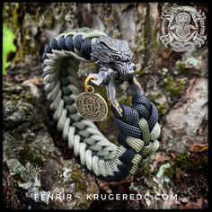 an image of a dragon bracelet on a tree