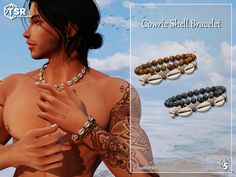 a man with tattoos and bracelets on his chest next to the ocean, looking at something