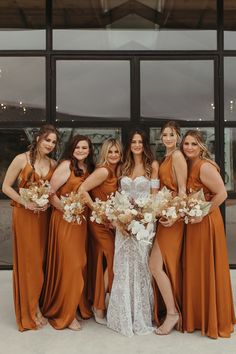 a group of women standing next to each other