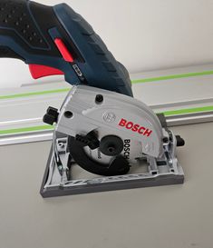 a bosch circular saw is being used to cut wood