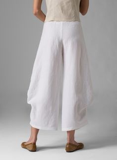 Linen Flared Leg Crop Pants Elegant Summer Harem Pants With Pockets, Elegant Baggy Harem Trousers, Chic White Ankle-length Harem Pants, Chic Relaxed Fit Wide Leg Pants, Chic Linen Straight Pants, Elegant Linen Pants For Loungewear, Chic Linen Bottoms With Elastic Waistband, Elegant Loose Fit Wide Leg Pants For Spring, Chic Straight Linen Pants