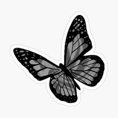 a black and white butterfly flying in the air sticker on a white background,