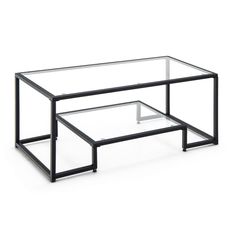 a glass and metal coffee table on white background