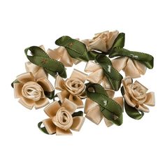 several small flowers with green leaves and bows on white background for decoration or hair clipping