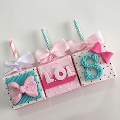 a pink and blue birthday card with the word lol spelled out in blocks that spell out