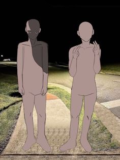 two people standing in the middle of a sidewalk at night with their backs to each other