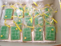 tennis court cookies are wrapped in plastic and ready to be eaten